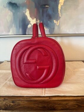 Authentic Gucci Red Pebbled Leather Boston Soho bag with Embossed GG